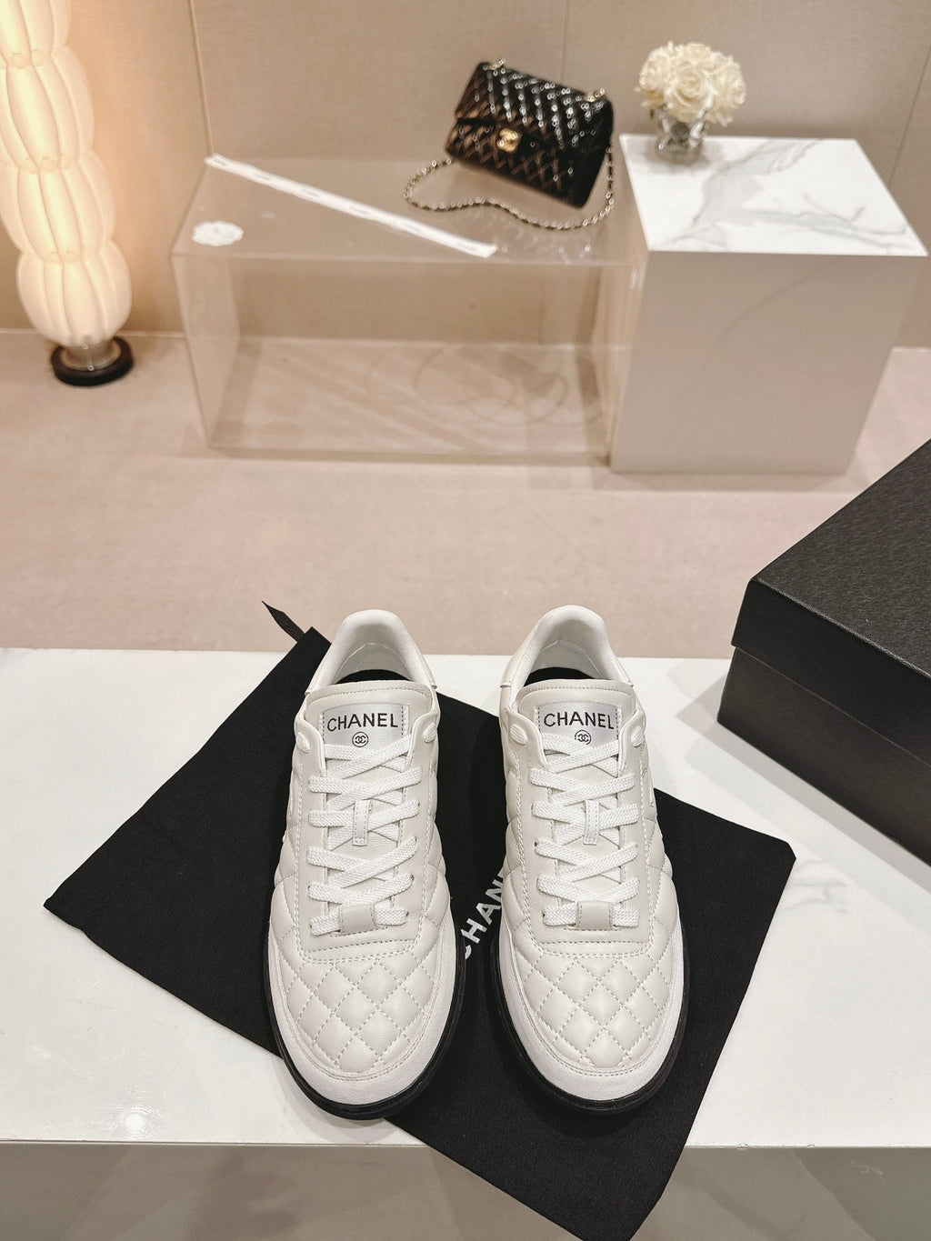 CHANEL SNEAKERS IN GLOSSY WHITE LAMBSKIN