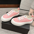 CHANEL LACE-UP SNEAKERS IN PASTEL PINK CANVAS